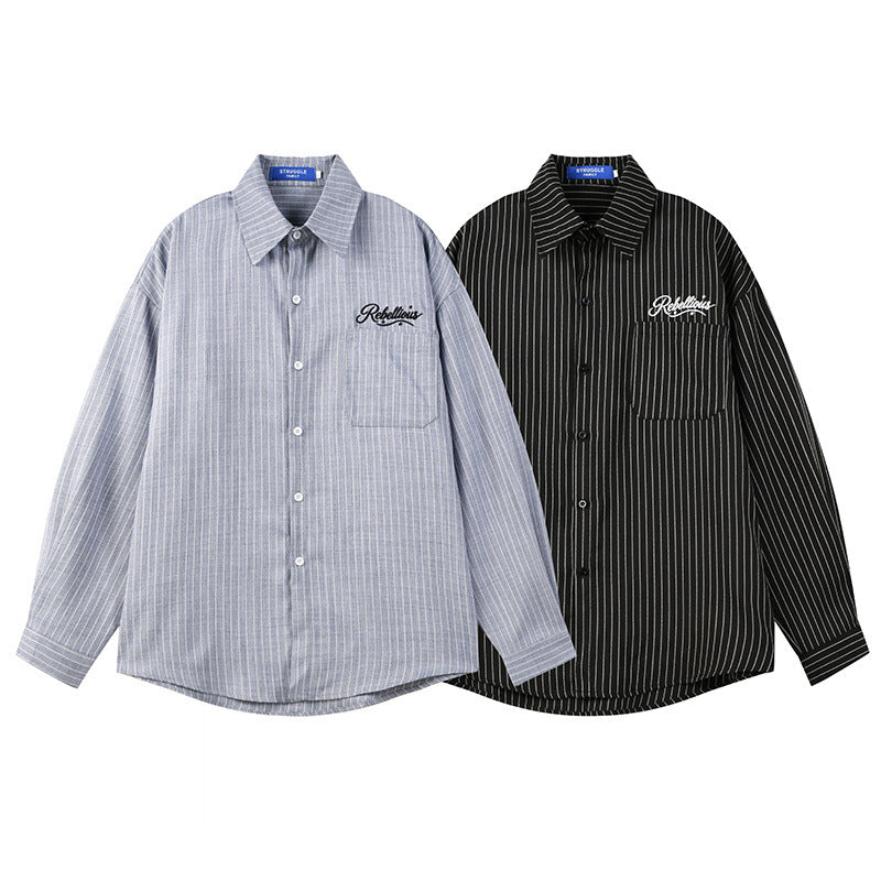 Oversized stripe long sleeve button-up shirt with Rebellious script embroidery on chest pocket, shown in black and grey color
