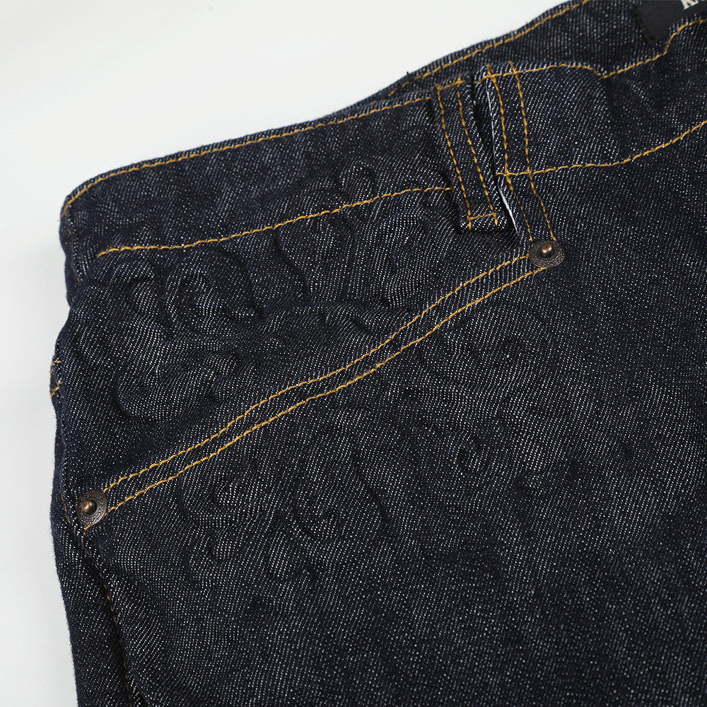 Wide-Leg Flare Jeans with Embossed Pocket Detail – Dark Indigo