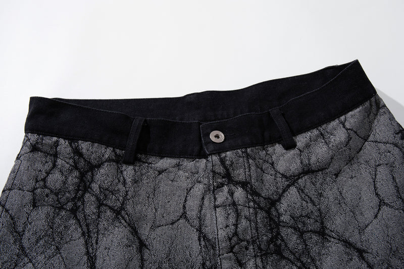 Jean baggy à jambes larges avec imprimé craquelé et rayures diagonales cloutées