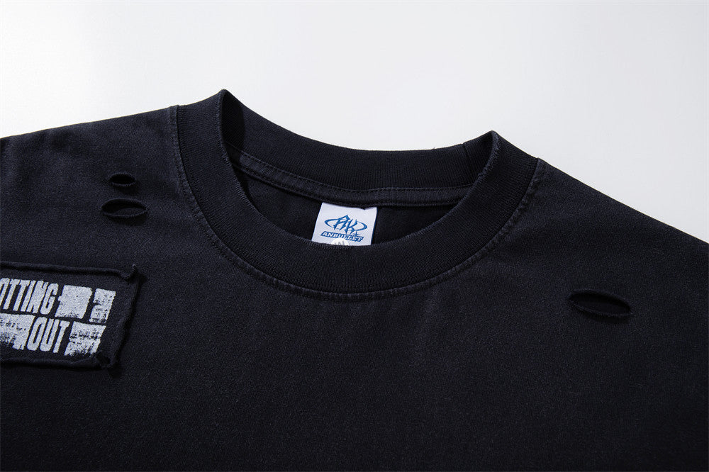 Longsleeve mit dunklen Grafik-Patches – Verwaschenes Oversized-Shirt aus Baumwolle