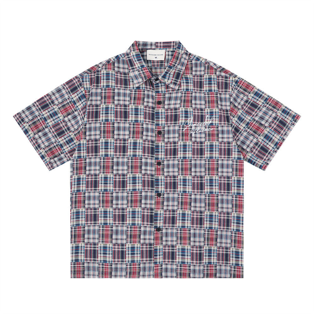 Men's oversized patchwork madras plaid short sleeve button-up shirt in red multi-plaid colorway, front view