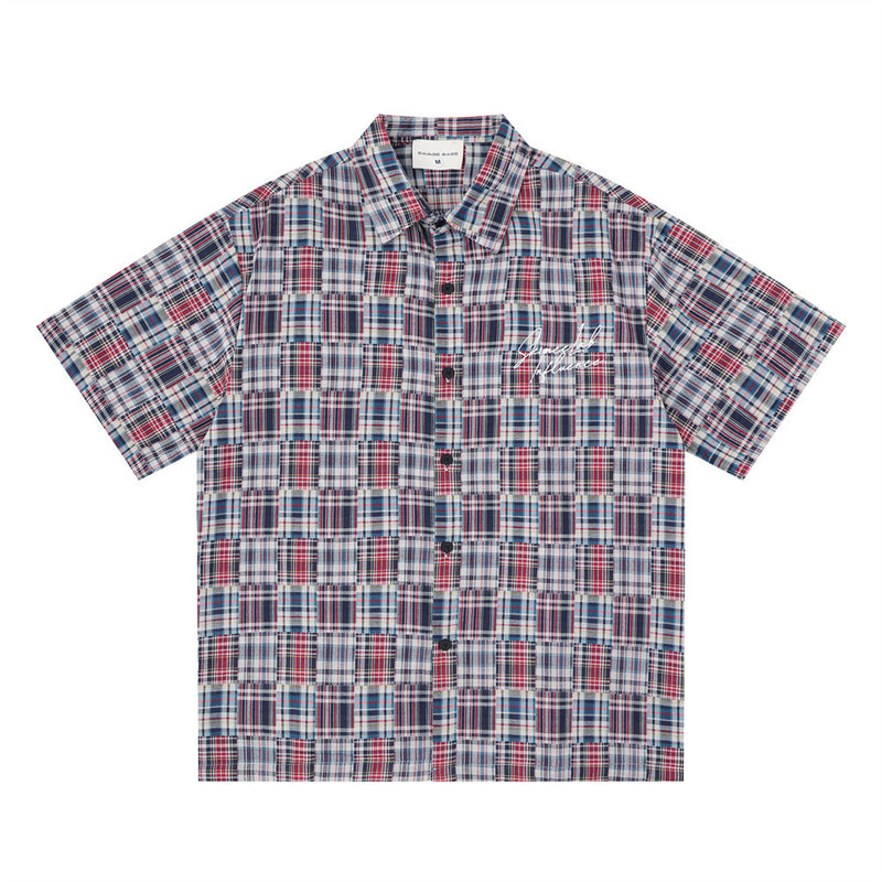 Men's oversized patchwork madras plaid short sleeve button-up shirt in red multi-plaid colorway, front view