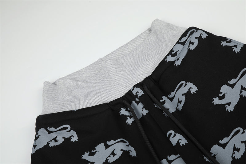 Pantalon de survêtement large imprimé lions, avec bande contrastante taille haute