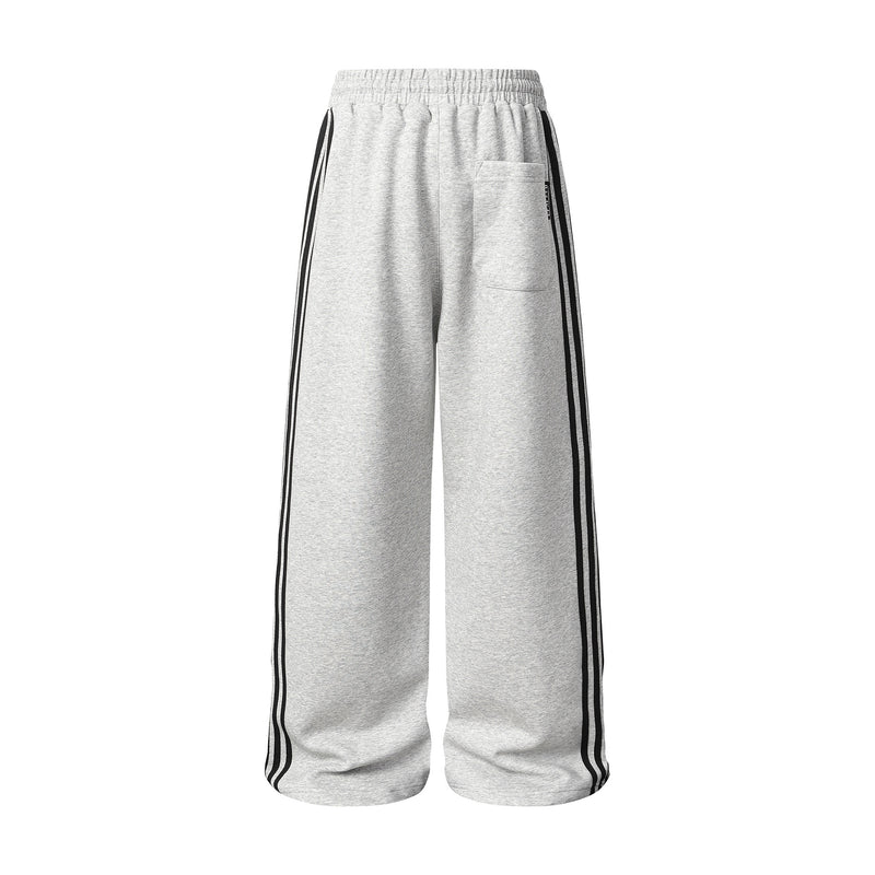 Pantalon de survêtement à jambes larges clouté d’étoiles 1996 avec détail à trois bandes