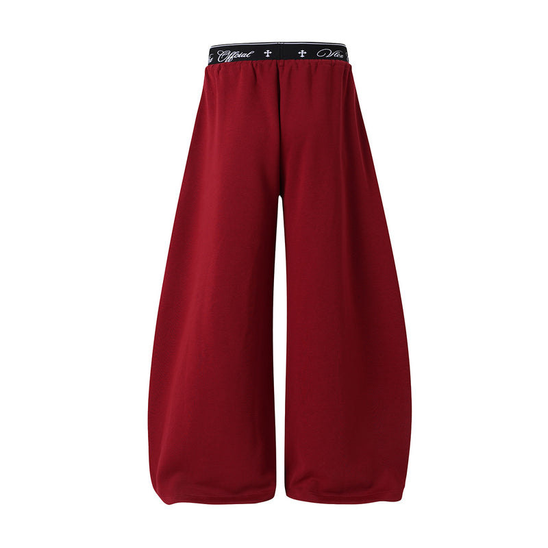 Pantalon de survêtement à jambes larges avec logo cursif et ceinture élastiquée