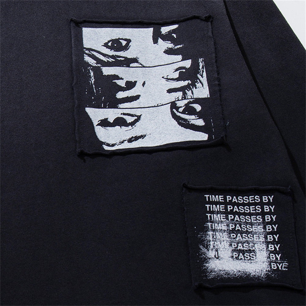 Longsleeve mit dunklen Grafik-Patches – Verwaschenes Oversized-Shirt aus Baumwolle