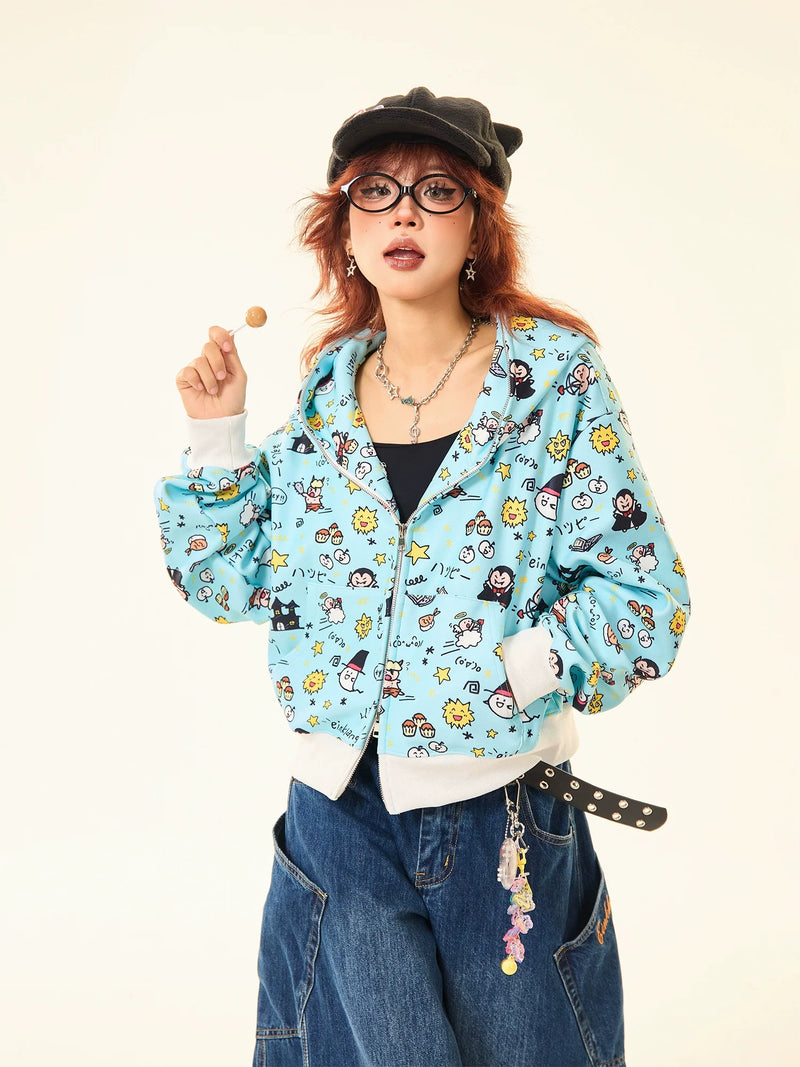 A red-haired person sports a black cap, round glasses, wide-leg jeans, and a whimsical streetwear look featuring Seakoff's Kawaii Cartoon Bear Hoodie with adorable ears. Playful accessories dangle from their belt while they hold a lollipop in one hand.