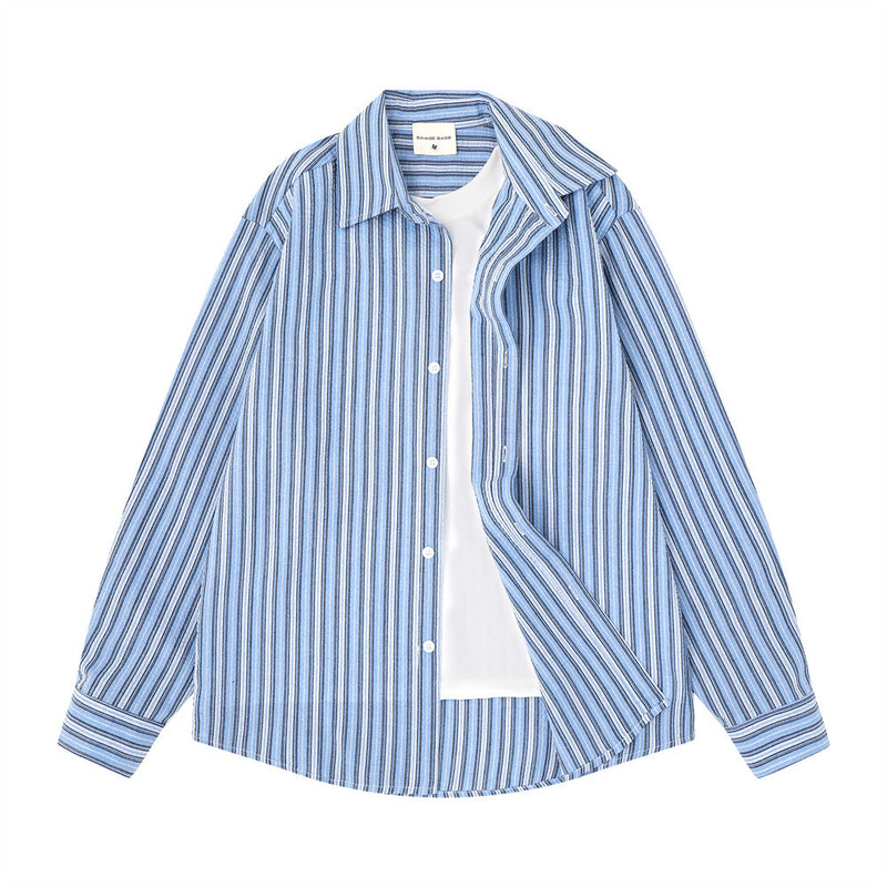 Blue striped shirt front view with faux layered white inner panel