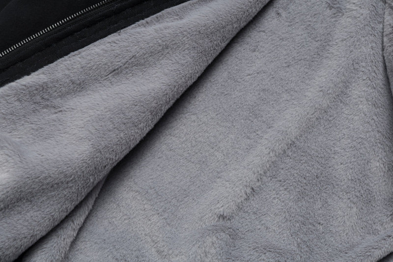 Chaqueta acolchada oversize con capucha y ribete de pelo sintético