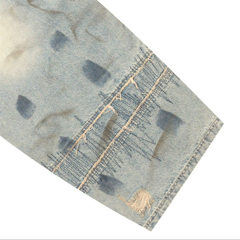 Men's Distressed Wide-Leg Jeans with Chaotic Embroidery & Metal Eyelet Detail
