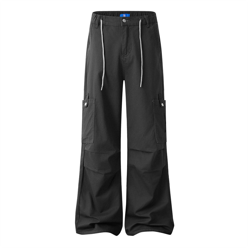 Men's baggy wide-leg cargo pants with snap-button flap pockets and dual drawstring waistband in dark grey