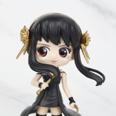 This chibi-style Yor PVC figure from the Spy × Family Complete Set features long black hair, gold spiky accessories, a sleek black dress, and a gold weapon. It stands elegantly on a light marble surface, perfect for any anime collection.