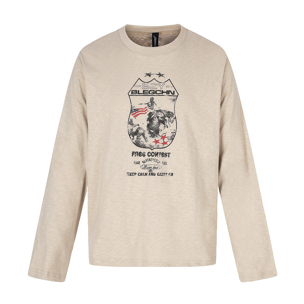 Beige long sleeve crew neck tee with bold front badge-style graphic