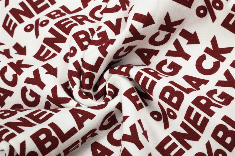 Close-up of white fabric twisted with red BLACK ENERGY lettering