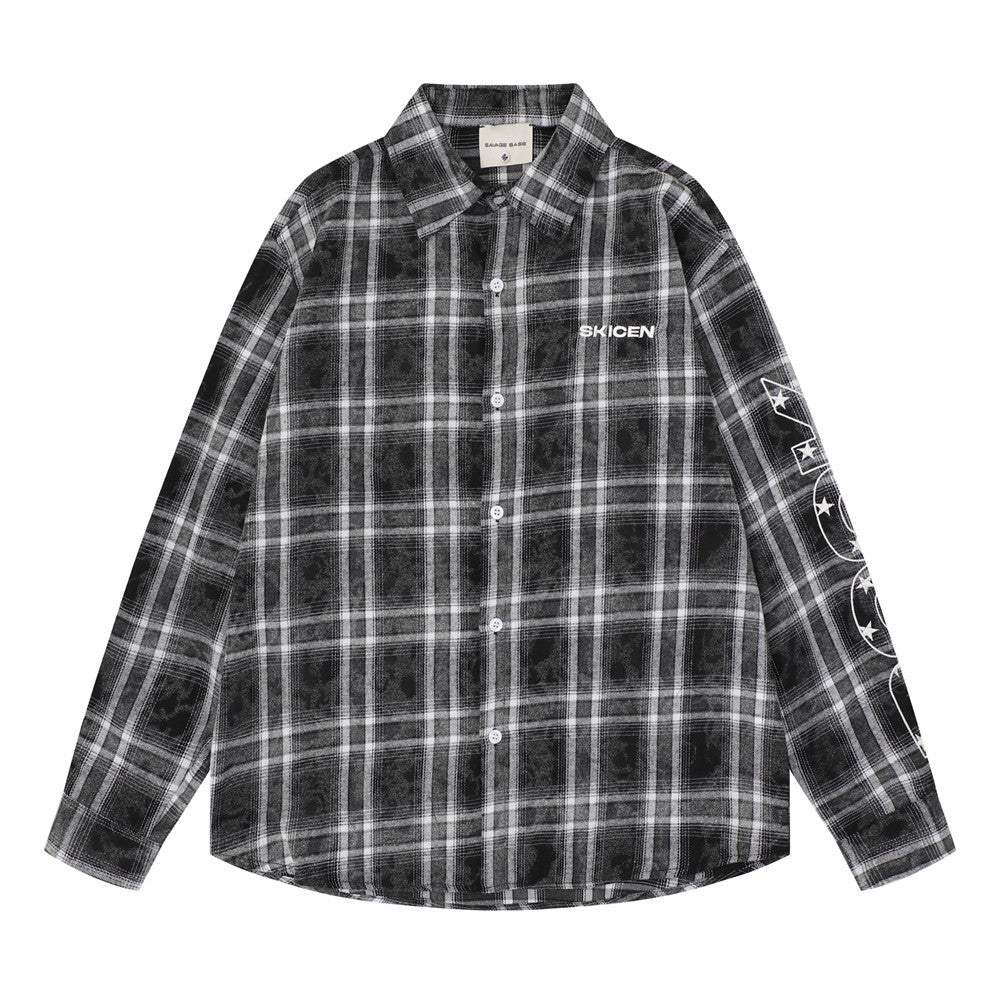 Front view of a black plaid long sleeve flannel shirt with white chest logo