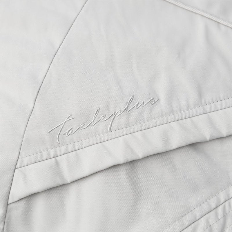 Oversized Puffer Bomber Jacket – Stand Collar, Geometric Seam Detail