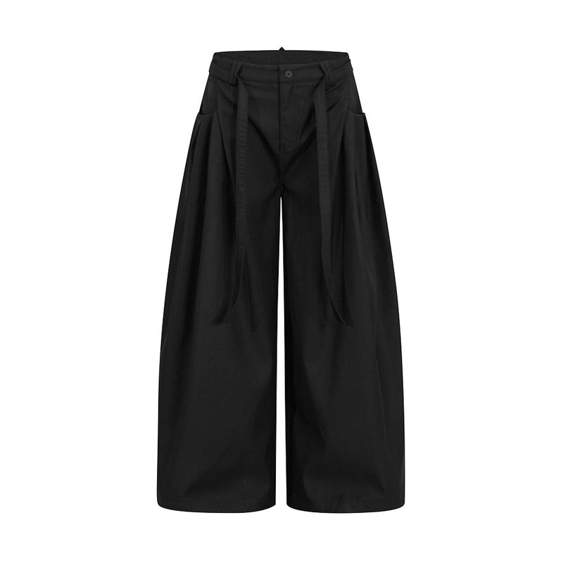 Men's wide-leg pleated trousers with drawstring waist in black, front view