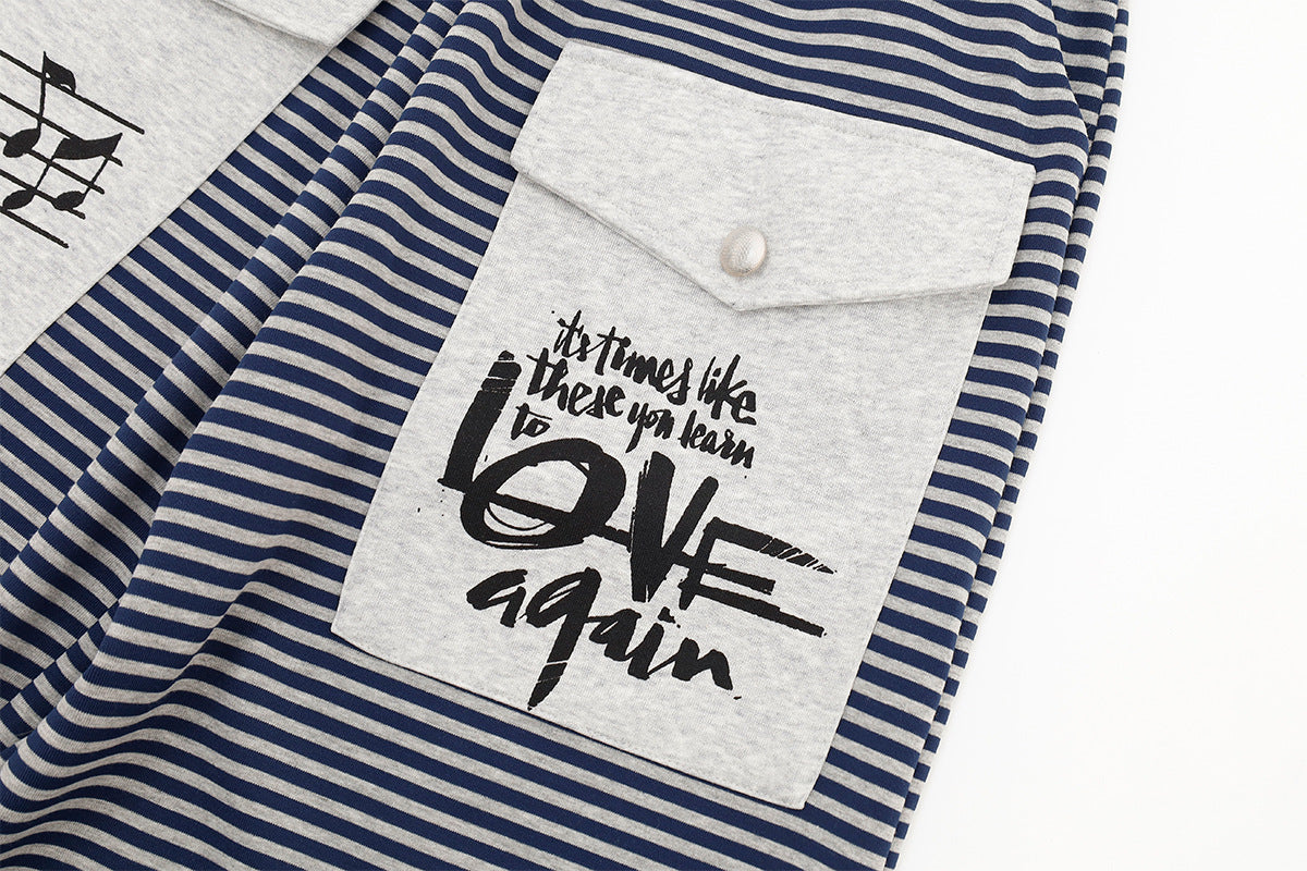Pantalon de jogging wide leg rayé avec imprimé notes de musique et poches cargo