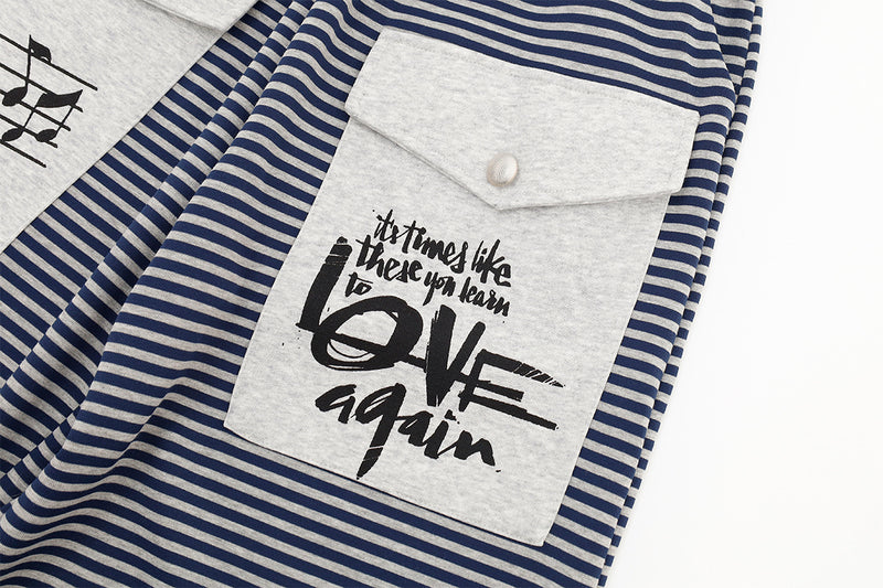 Pantalon de jogging wide leg rayé avec imprimé notes de musique et poches cargo