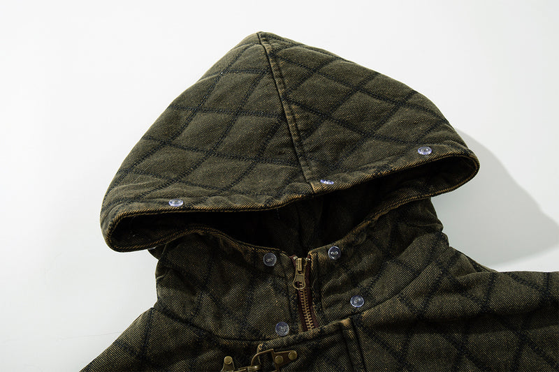 Olive green quilted jacket hood shown raised, with snap fasteners and a front zipper visible