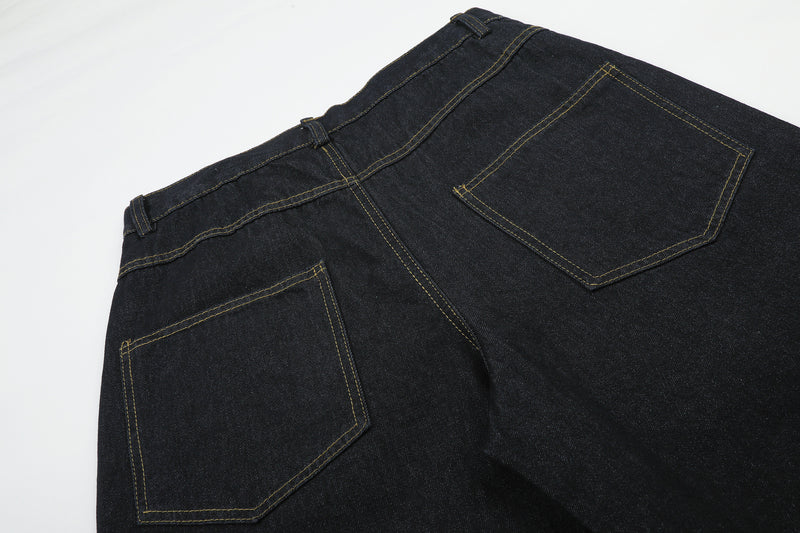 Jean baggy délavé foncé avec bas en fausse fourrure et broderie manuscrite – Coupe ample