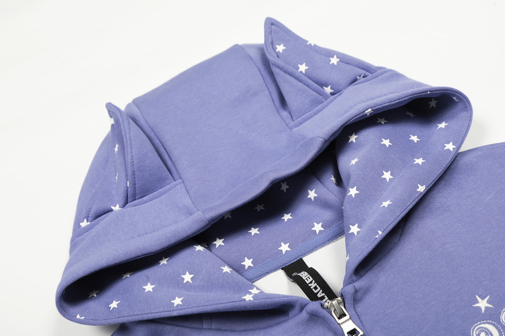Sweat zippé à capuche avec oreilles de diable et doublure étoilée — Style vintage américain court