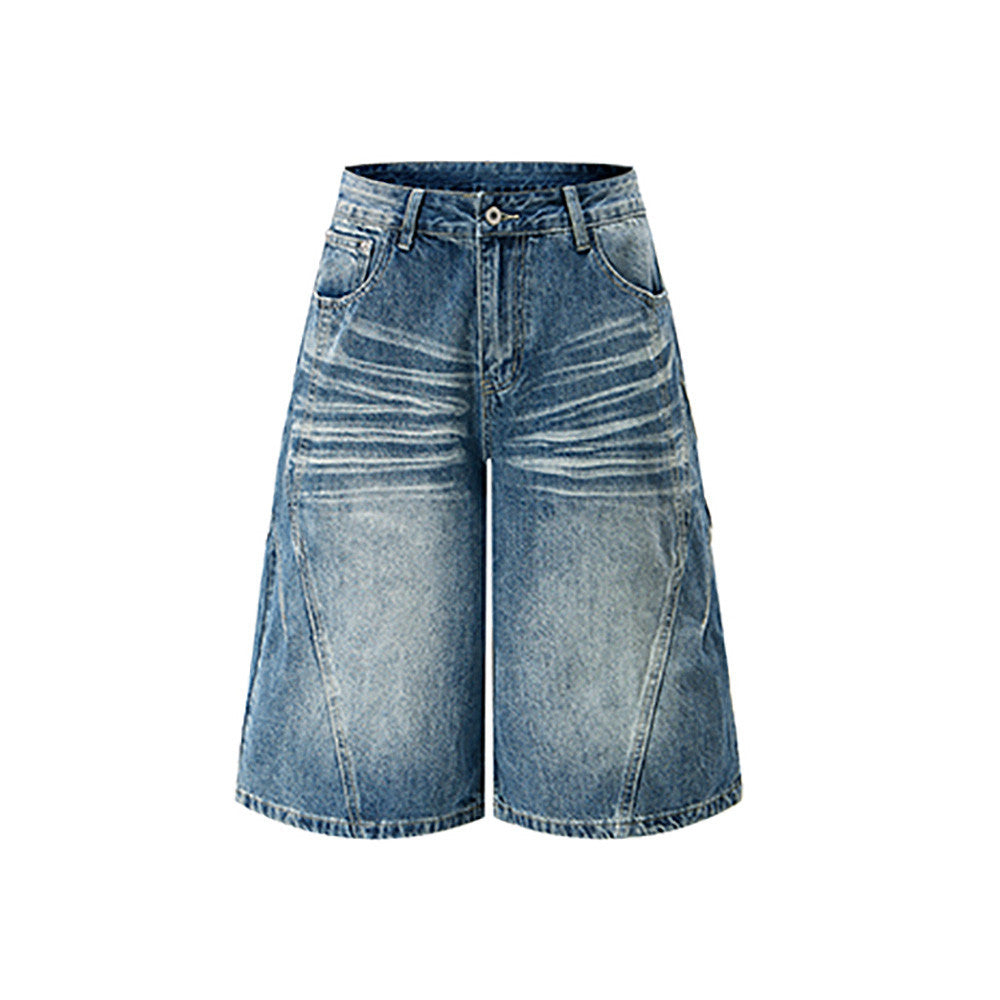 Light blue baggy denim shorts with front pockets, whiskering and wide legs