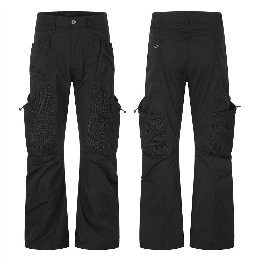 Men's black cargo utility pants with mesh panel inserts, large cargo pockets, and wide-leg straight silhouette, front and bac