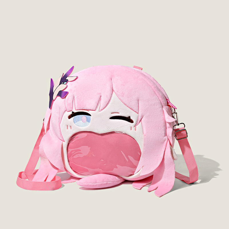 Seakoff's Honkai Impact 3rd Seele Vollerei Plush Shoulder Bag features a round pink design with character face details, large eyes, an open mouth pocket, pink hair accents, a detachable strap, and a decorative purple accessory.