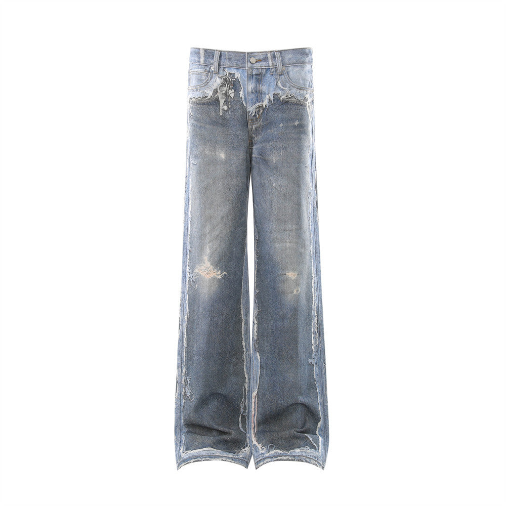 Men's wide-leg distressed jeans in vintage blue wash with raw-edge seams, ripped knees, and frayed hems shown front and back