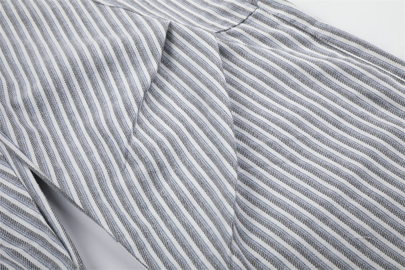 Pantalon à rayures et jambes larges – Taille haute déconstruite, bas incurvé