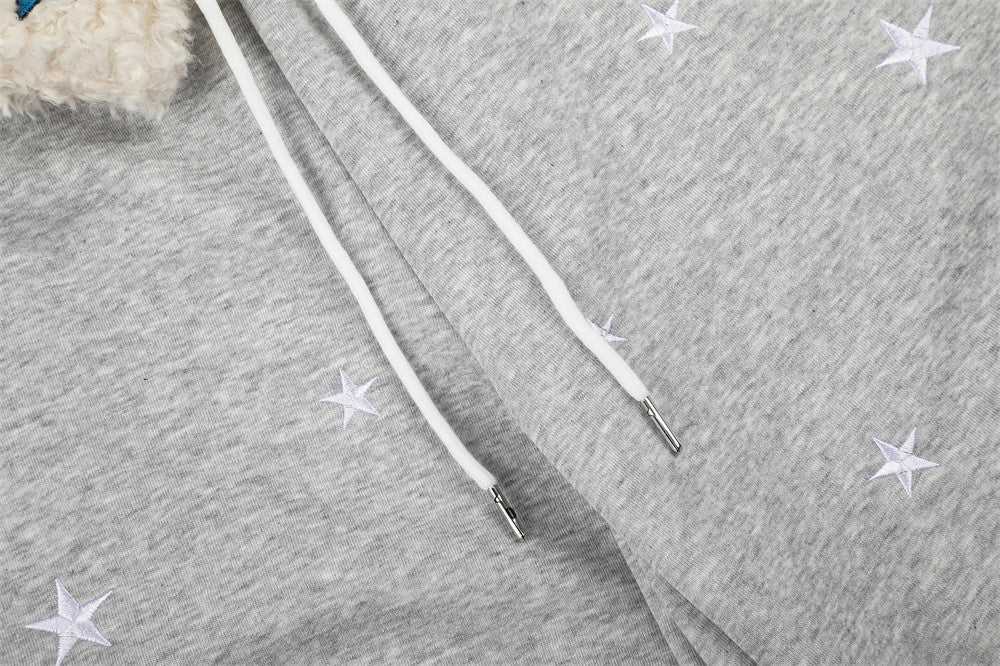 Sweatpants mit weitem Bein, Sternstickerei und umgeschlagenem Sherpa-Bund