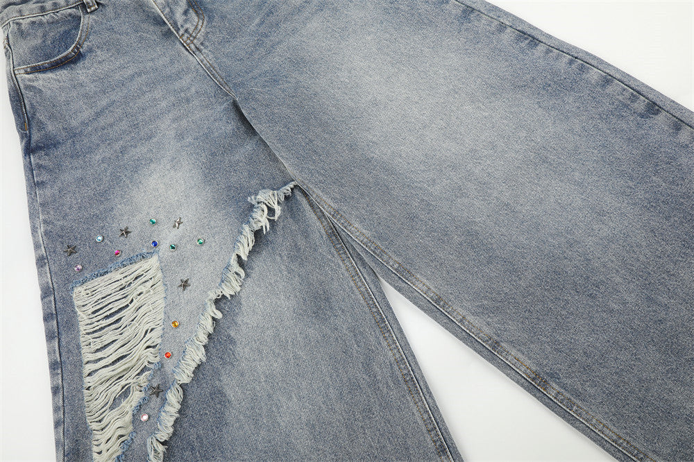 Jean large déchiré pour homme avec ornements en strass et étoiles