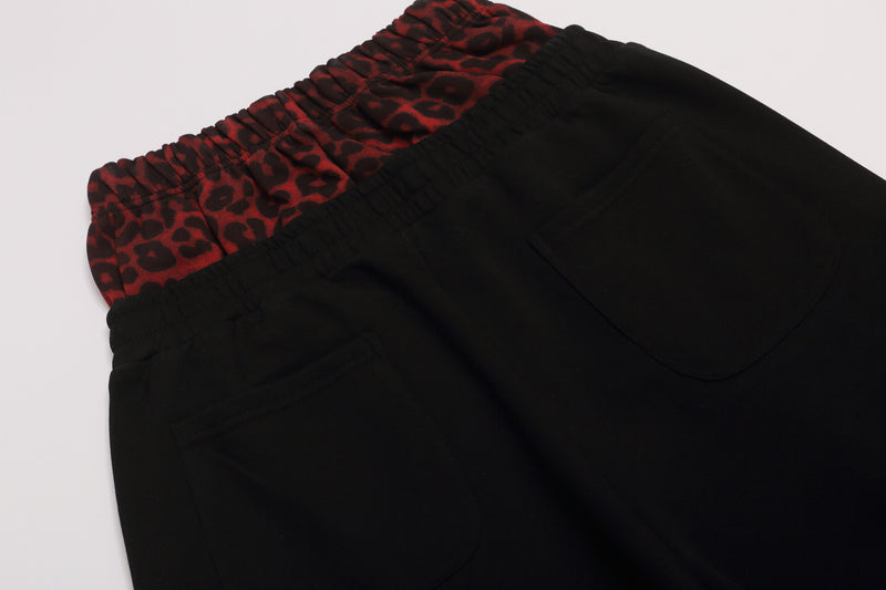 Wide-Leg-Jogginghose mit Leo-Print-Bund & seitlichen Nieten