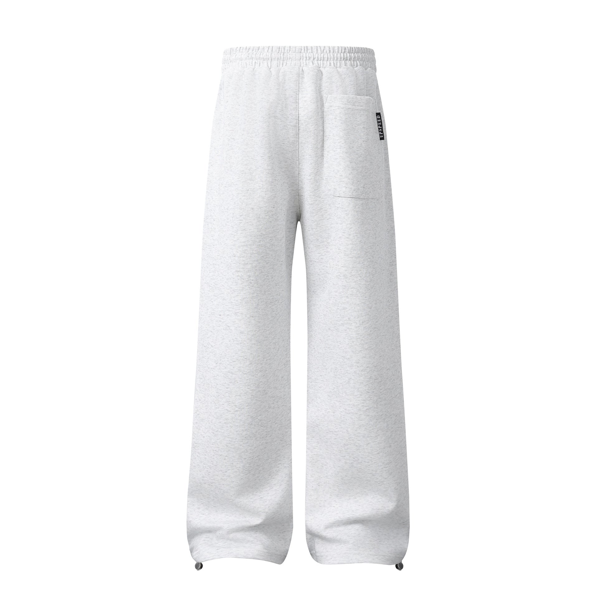 Pantalon de survêtement à jambes larges avec graphisme héraldique et détails latéraux multibandes