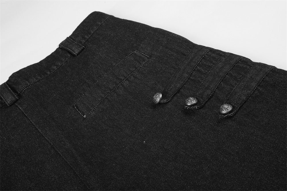 Close-up of black denim back waist panel with pleats and three side buttons