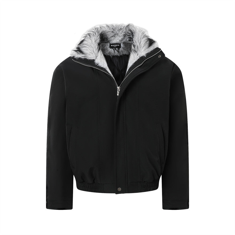 Oversized black bomber jacket with faux fur lining and fur-trimmed collar, front view
