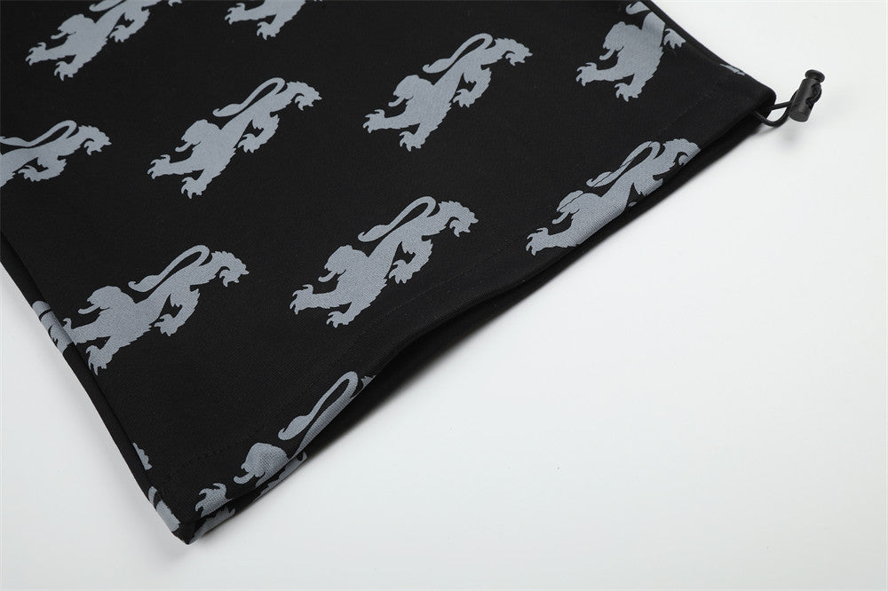 Pantalon de survêtement large imprimé lions, avec bande contrastante taille haute