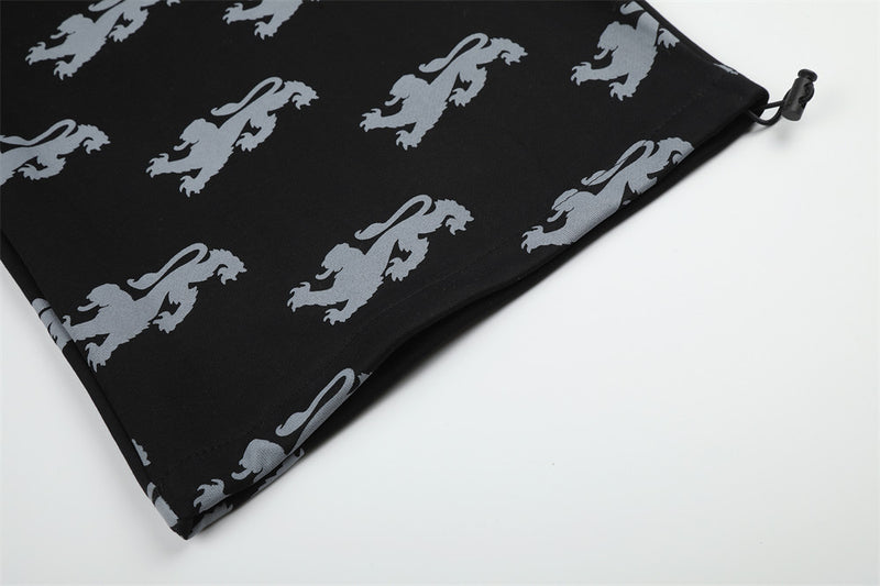 Pantalon de survêtement large imprimé lions, avec bande contrastante taille haute