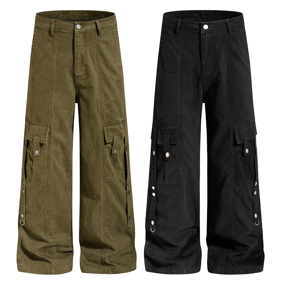 Wide-leg punk cargo pants with multi-pocket flaps, snap buttons, and D-ring side straps in washed black and army green