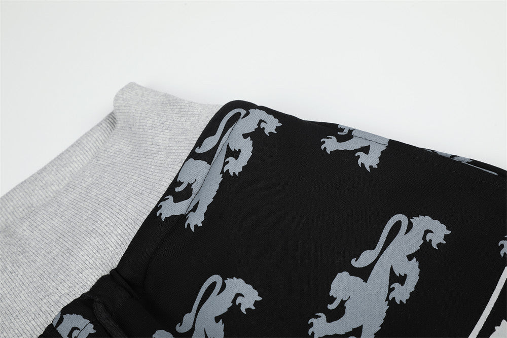 Pantalon de survêtement large imprimé lions, avec bande contrastante taille haute