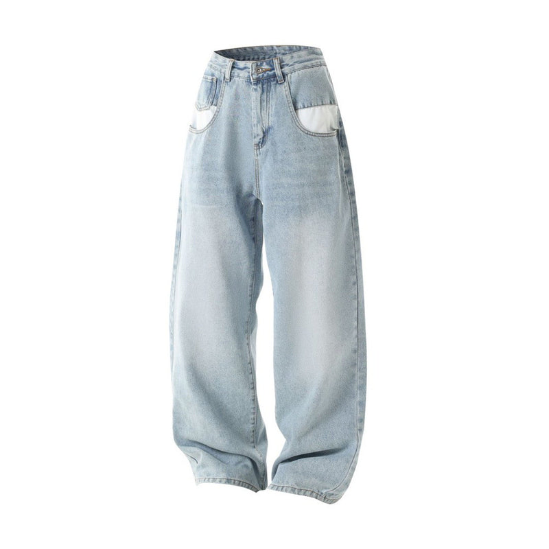 Light wash baggy jeans angled front view with contrast pocket panels