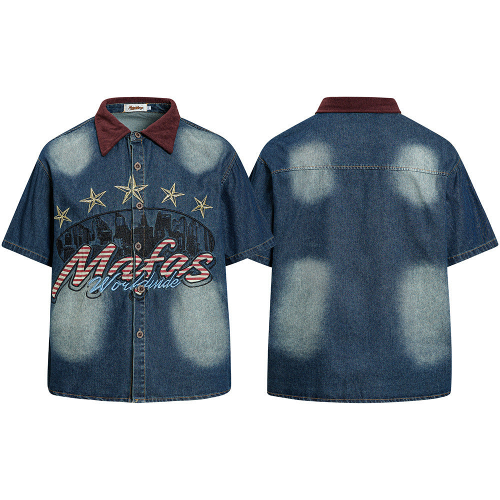 Oversized short-sleeve washed denim shirt with Mafas Worldwide embroidered graphic, gold star patches, and burgundy corduroy