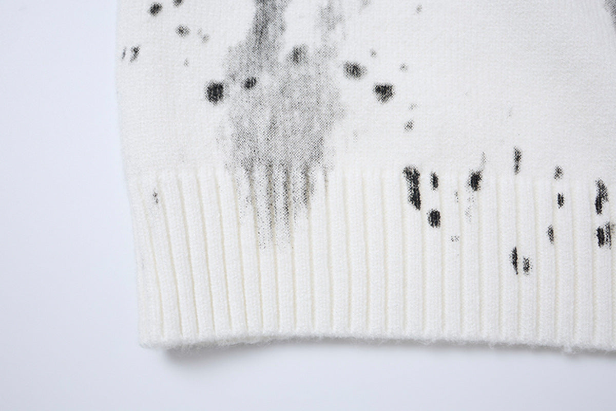 Pull en maille col rond éclaboussures d’encre – Motif peinture déstructuré