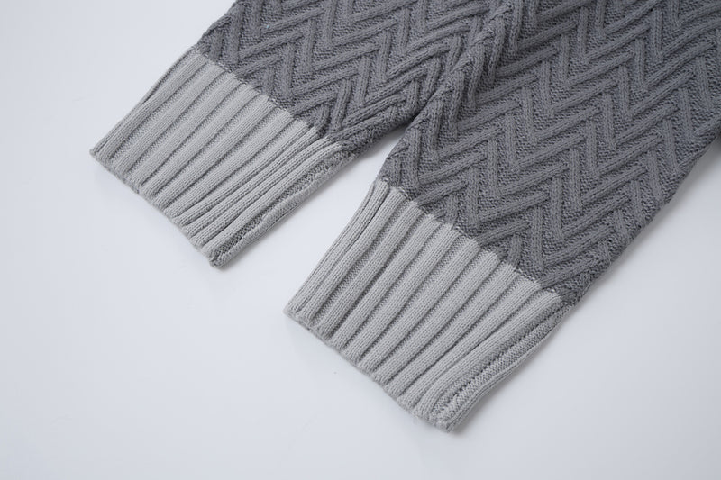 Cardigan en maille torsadée chevrons avec col châle et poches avant