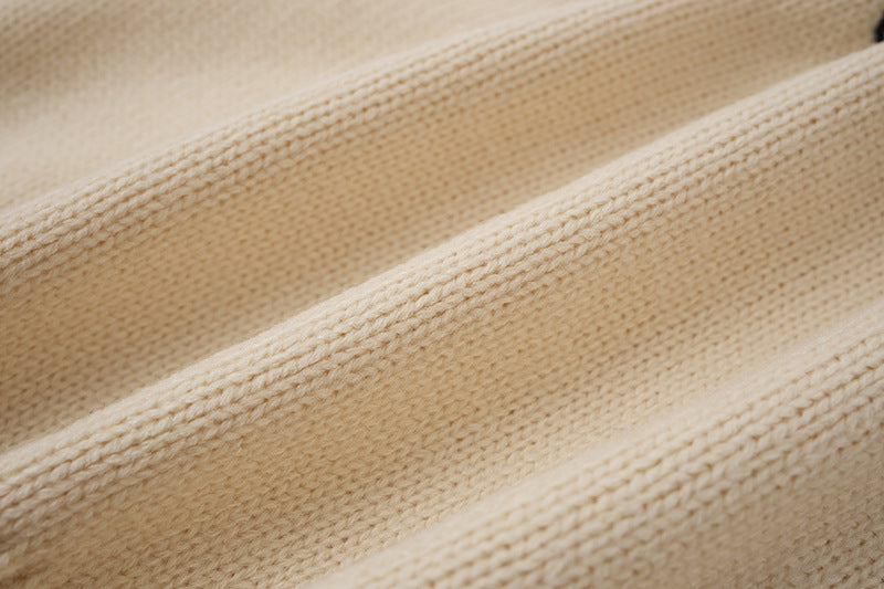 Pull en maille destroy à broderies croisées – Sweat oversize à col rond