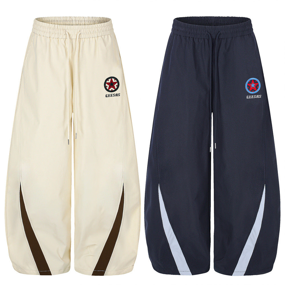 カラーブロックトラックスーツセット｜スタンドカラージップジャケット＆レタリング入りワイドレッグパンツ