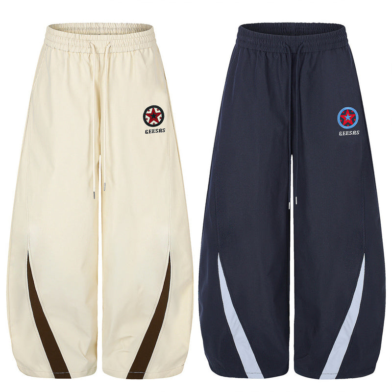 カラーブロックトラックスーツセット｜スタンドカラージップジャケット＆レタリング入りワイドレッグパンツ