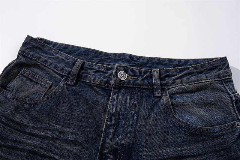 Wide-Leg Ripped Jeans – Vintage Washed Distressed Denim with Studded Patches