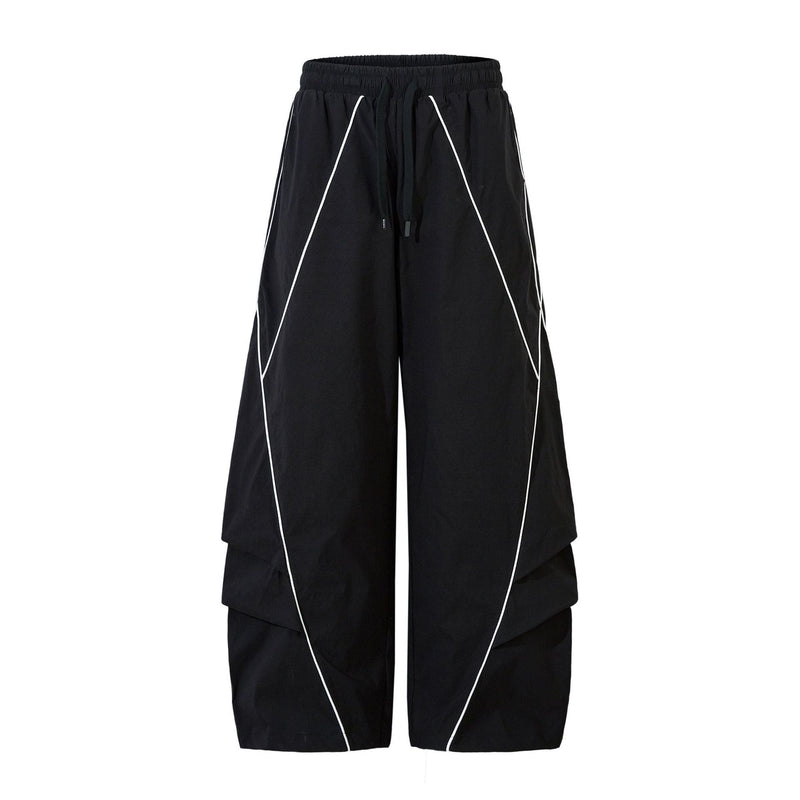 Herren-Trackpants mit kontrastierender Paspel und Colorblock-Seiteneinsätzen